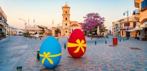 Giant decorative Easter eggs set against the backdrop of the iconic St. Lazarus Church.