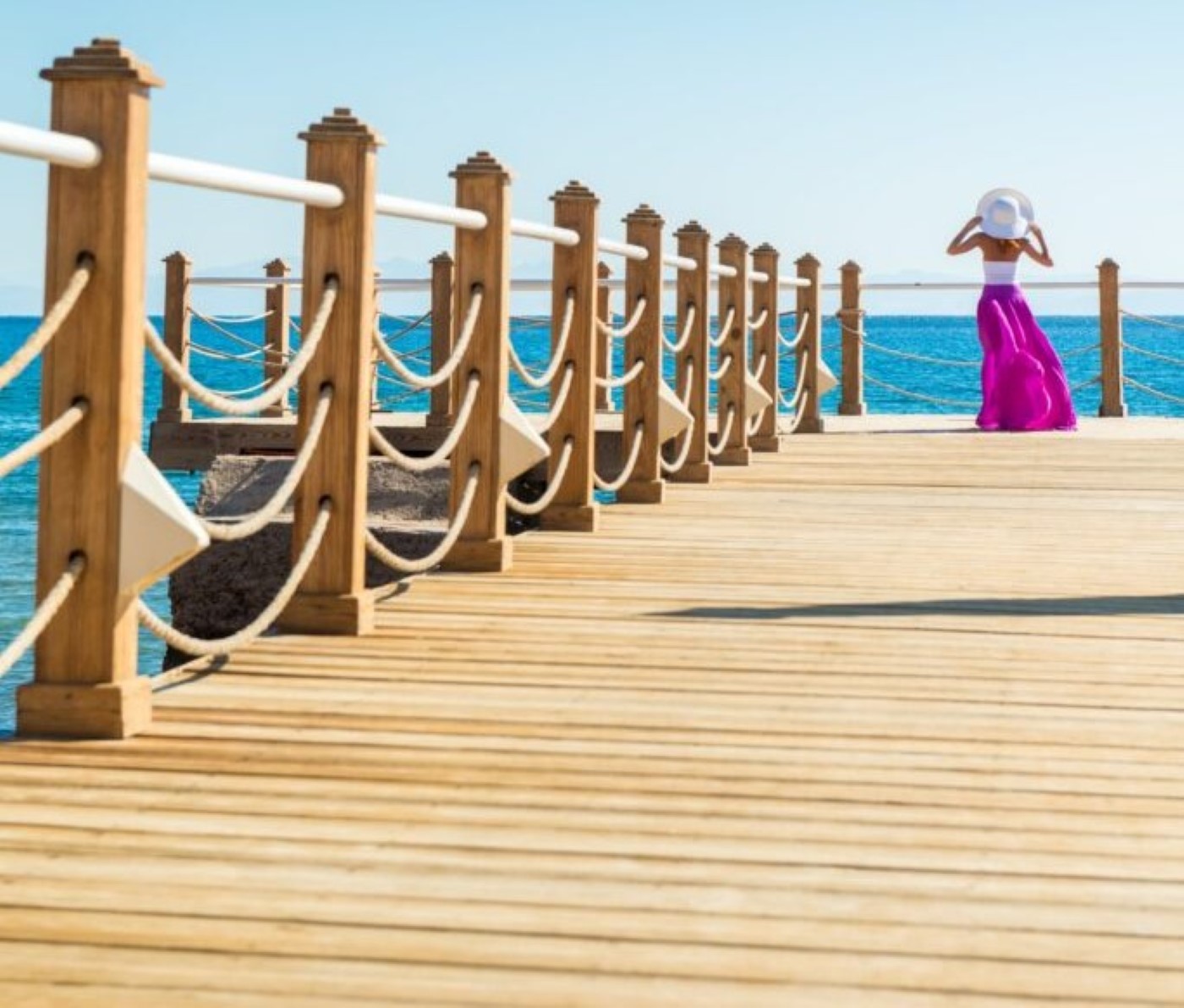 Amidst the historic architecture of Larnaca, a couple wanders through bustling market streets. Surrounded by artisan stalls showcasing intricate crafts, locals immersed in their trade, and the lively atmosphere of the city, they experience a blend of tradition and contemporary allure that the city offers.