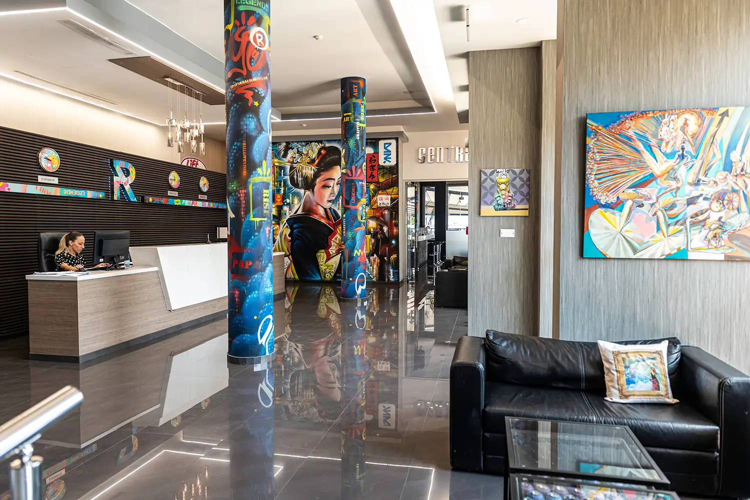 Reception area with colorful murals