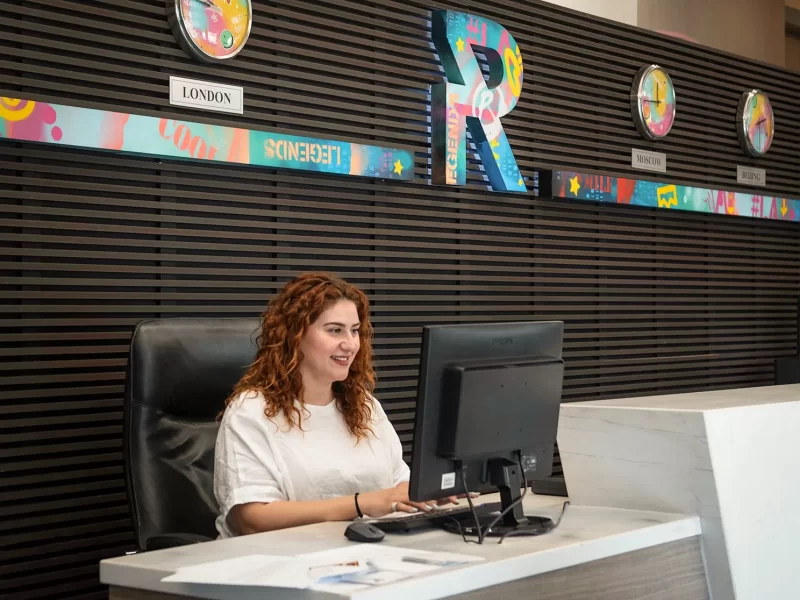 Receptionist at desk